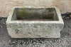 Pilón de piedra caliza rectangular