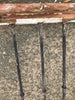 Barandilla de hierro y madera.