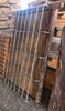 Ventana de madera con reja embutida.
