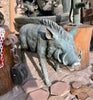 Escultura de jabalí en bronce.