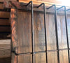 Ventana de madera con reja embutida.