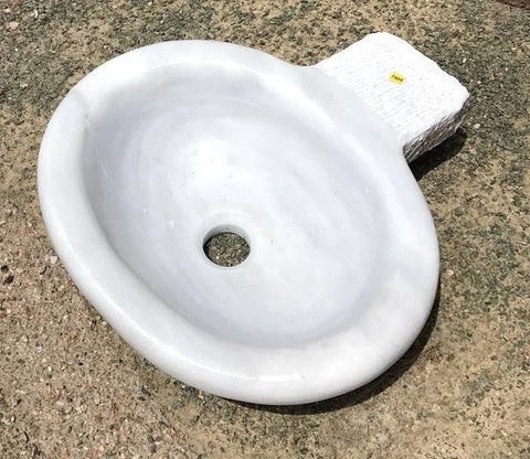 Pila de agua bendita con desagüe
