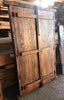 Ventana de madera con reja embutida.