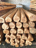 Vigas de madera redondas.