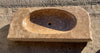 Lavabo de piedra travertino amarillo.