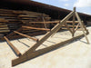Cercha de madera montada con palos redondos.