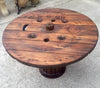 Mesa reciclada con bobina antigua.
