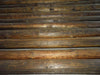 Vigas redondas de madera.