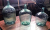 Conjunto de damajuanas rectas.